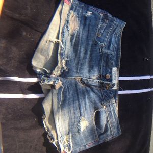 Pair of adorable light blue, ripped short shorts